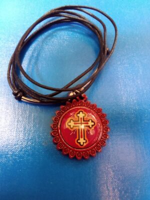 Risti kujutisega ripats